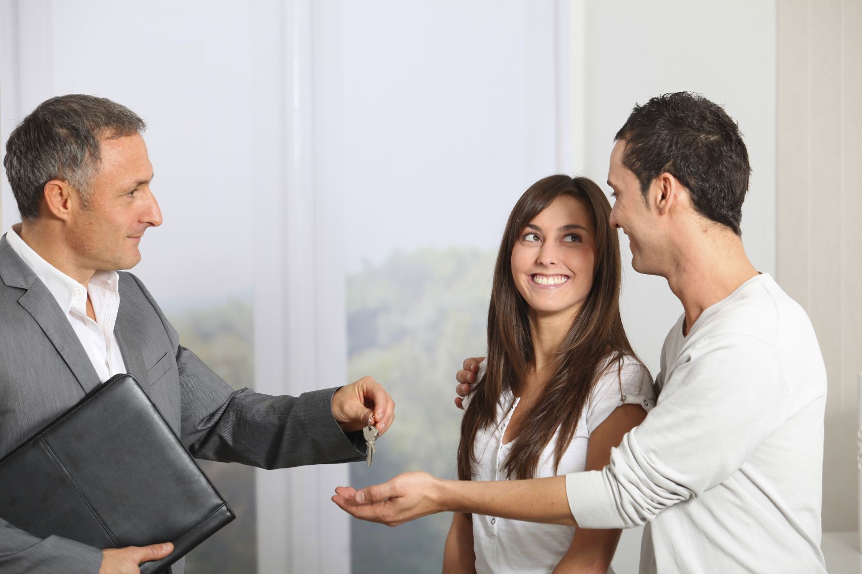 Young couple buying new home