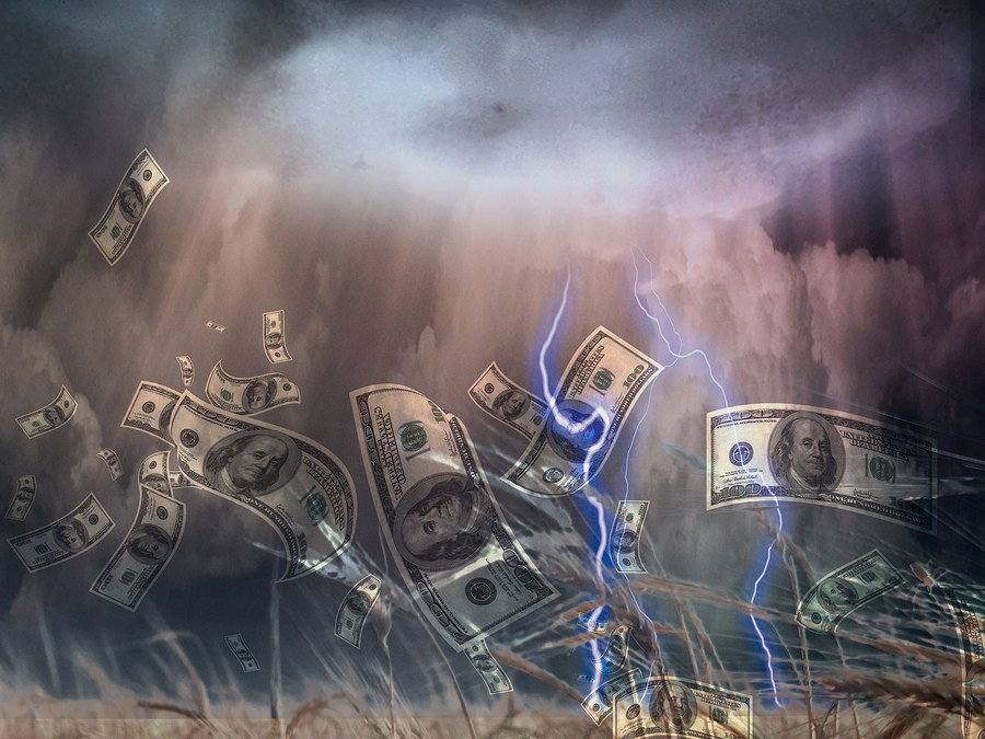 Violent storm and US Currency